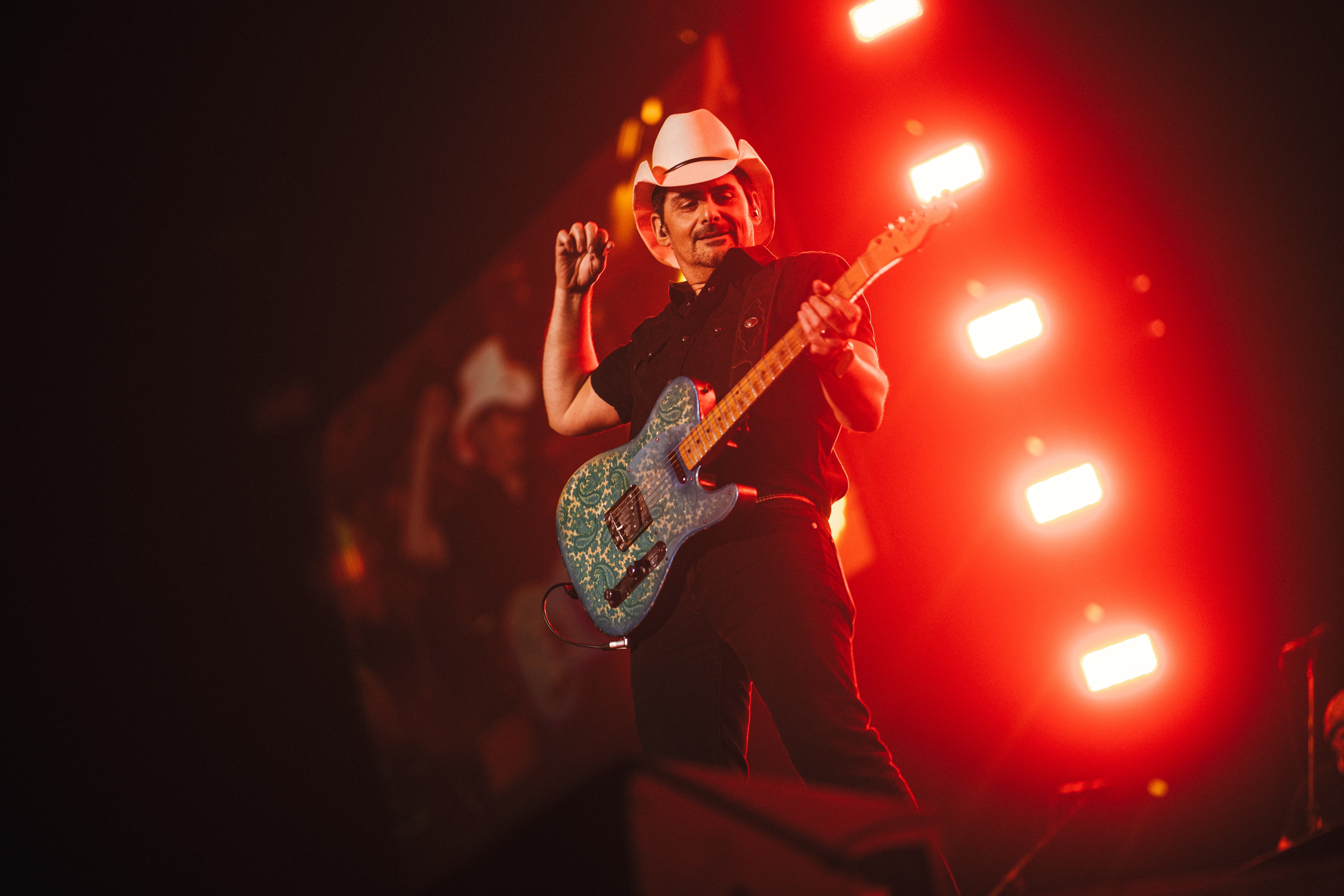 Brad Paisley playing guitar on his 2024 European tour